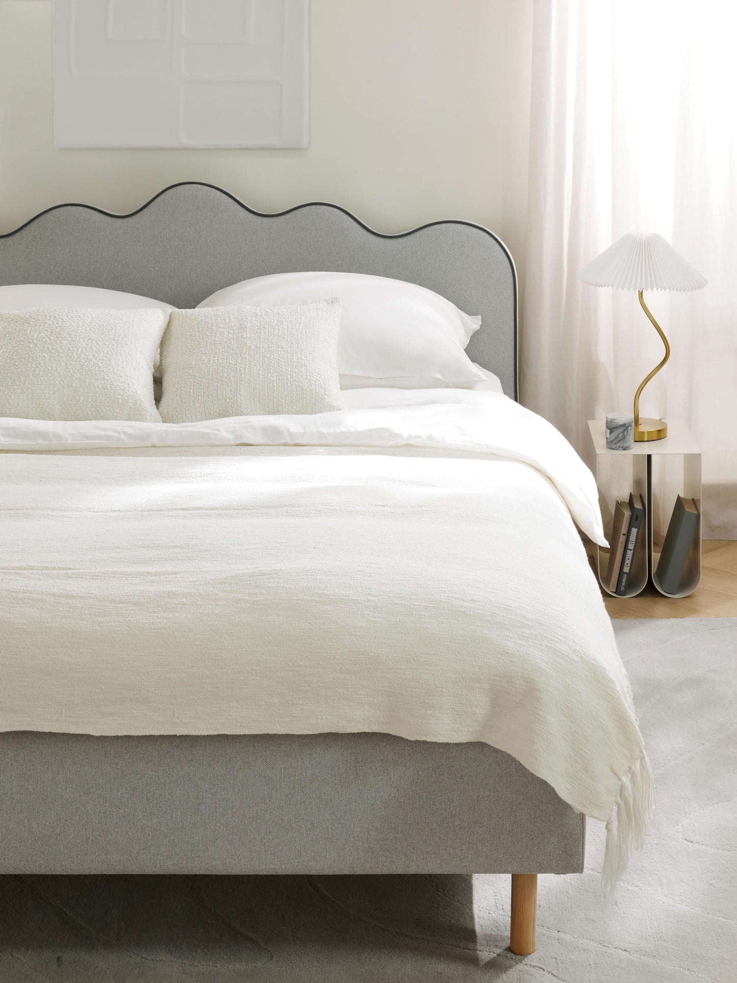 Romelis Upholstered Bed with Wavy Headboard