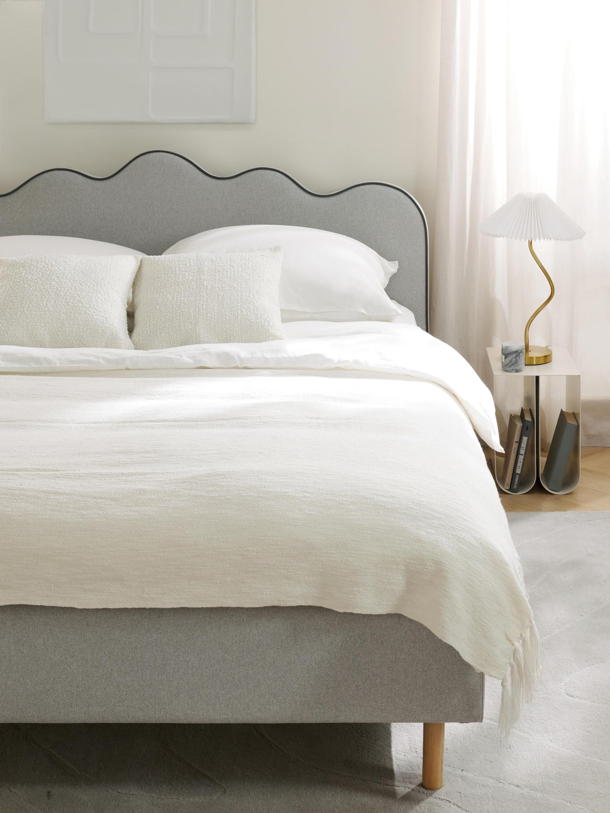 Romelis Upholstered Bed with Wavy Headboard